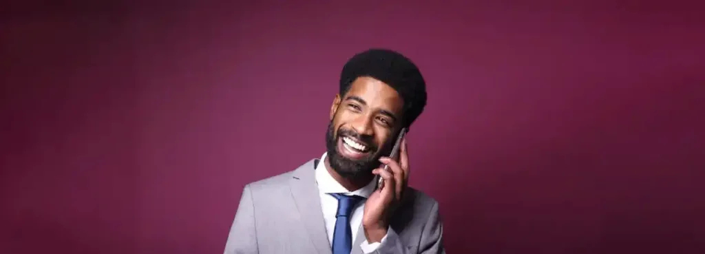 business-man-calling-and-smiling